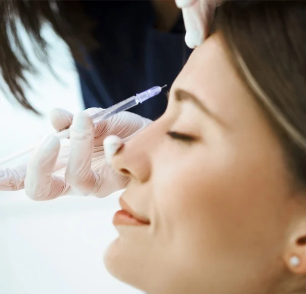 woman receiving an injection in the forehead - north jersey dental group